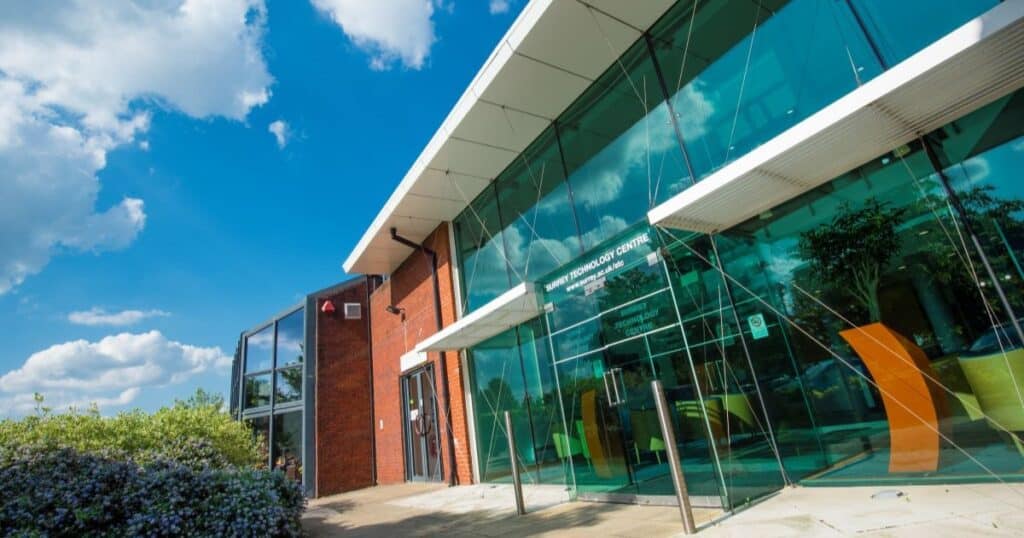 The exterior of a glass fronted office building.
