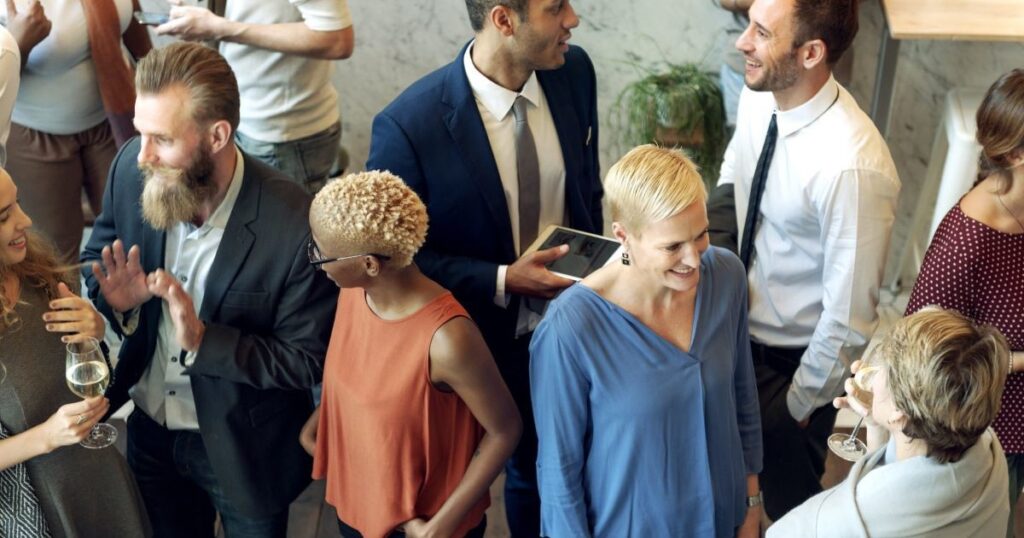 Image of people networking at a business event