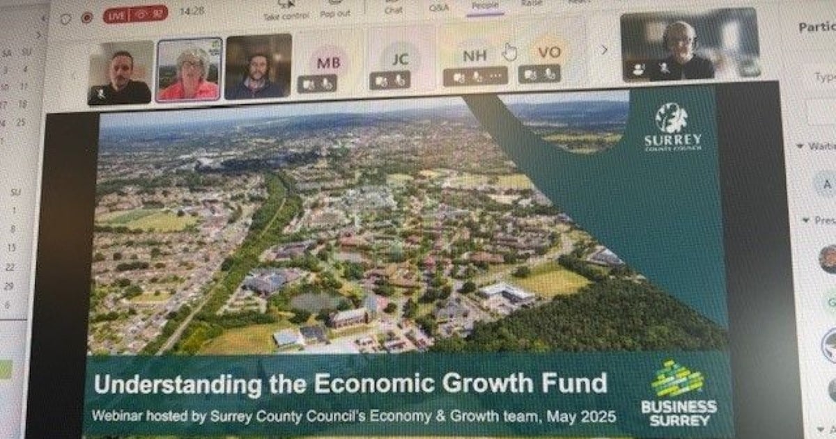Close up of a computer screen during a online webinar. On the screen is a title page called "Understanding the Surrey Economic Growth Fund"