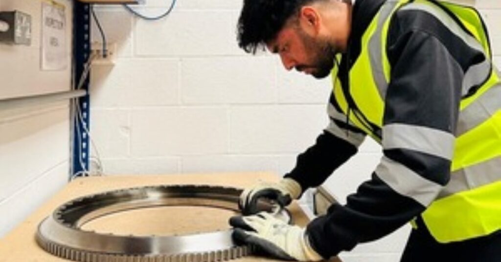 Receiving inspector closely examines a low-pressure turbine disk from a CFM56-5B engine at 3TOP Aviation’s facility in Leatherhead, Surrey.