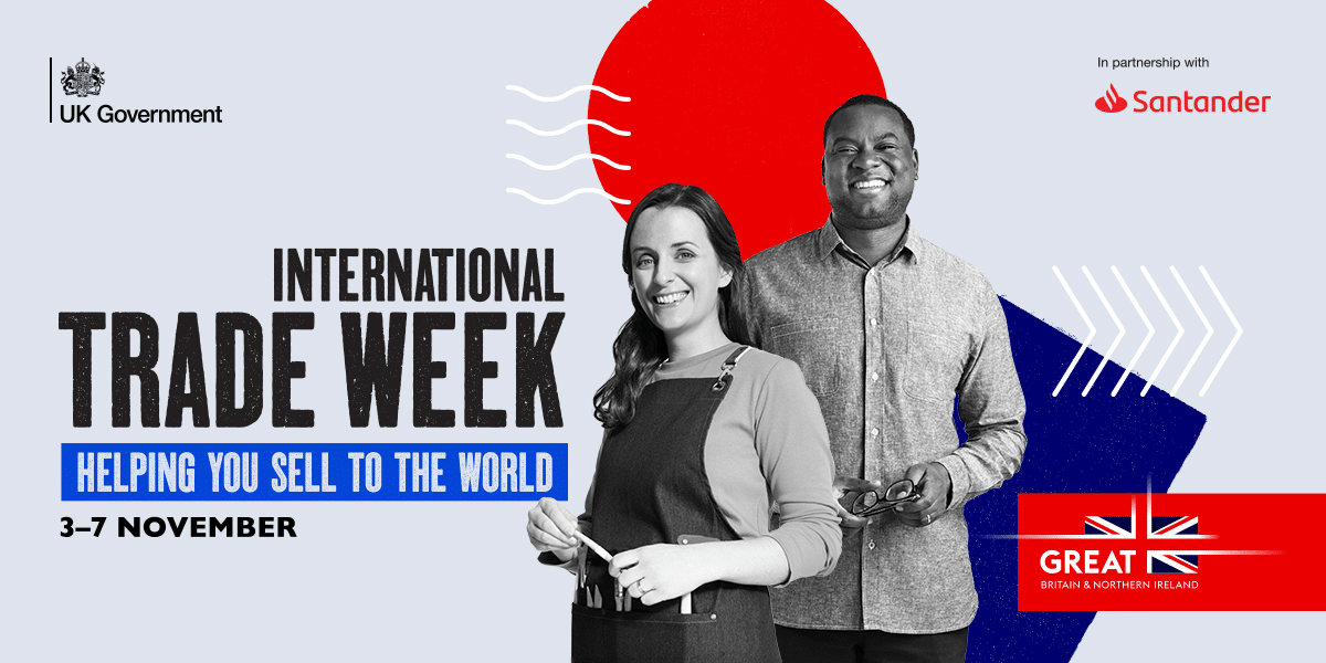 Two people standing on a colourful background