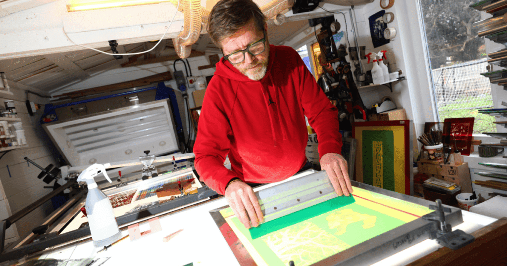 Halt glass - Jim screenprints onto glass in his Surrey workshop