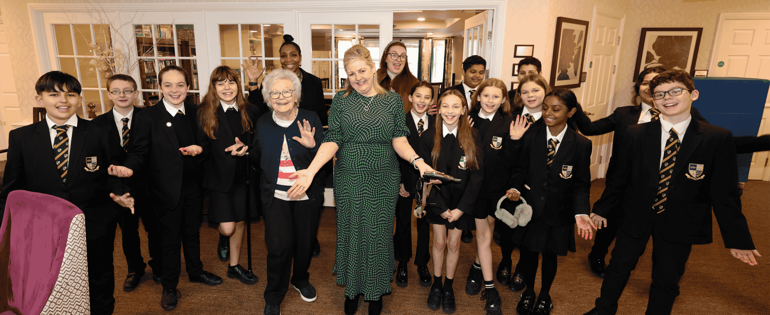 students and staff taking part in work experience visit to a Surrey care home.