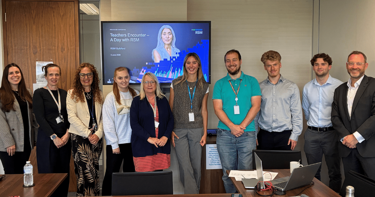 Teacher encounters | Business Surrey | future workforce | A group of teachers stand together in an office setting on a teacher encounter visit