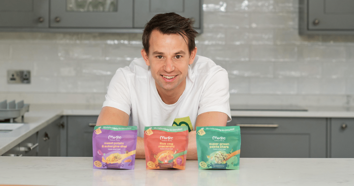 More Toddler Meals - founder at a kitchen counter with samples of meals on counter in front of him. | Business Surrey | Surrey businesses parenting awards |
